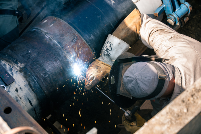 man welding